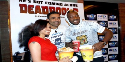 Robin Uthappa with his wife and Andre Russell - team Kolkata Knight Riders watch Deadpool 2